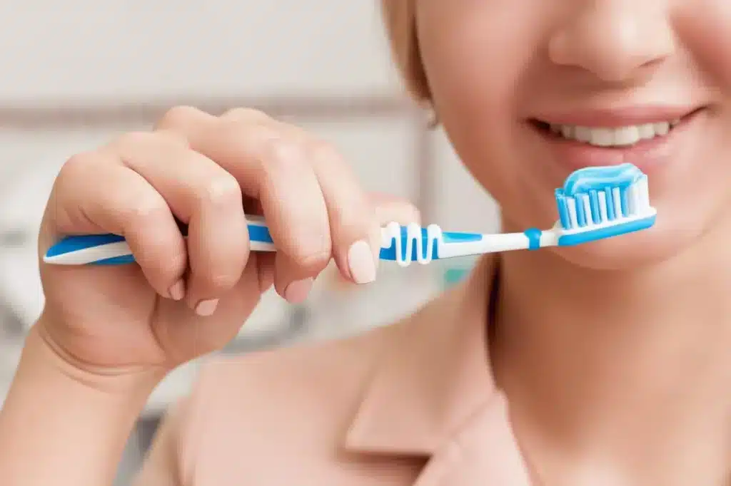 Woman Brushing Teeth