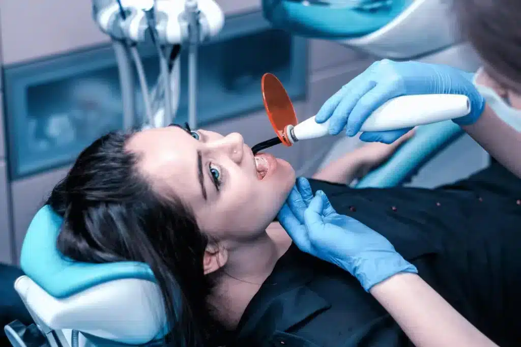 Patient Under Dental Fillings Procedure