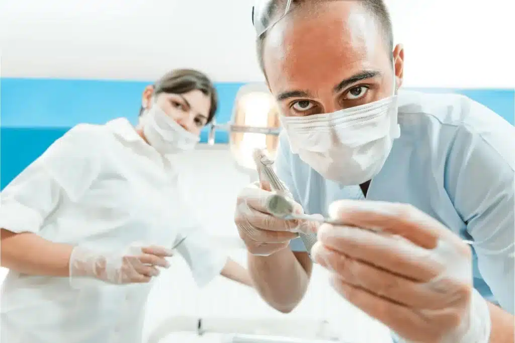 Dentist's Preparing for Tooth Extraction