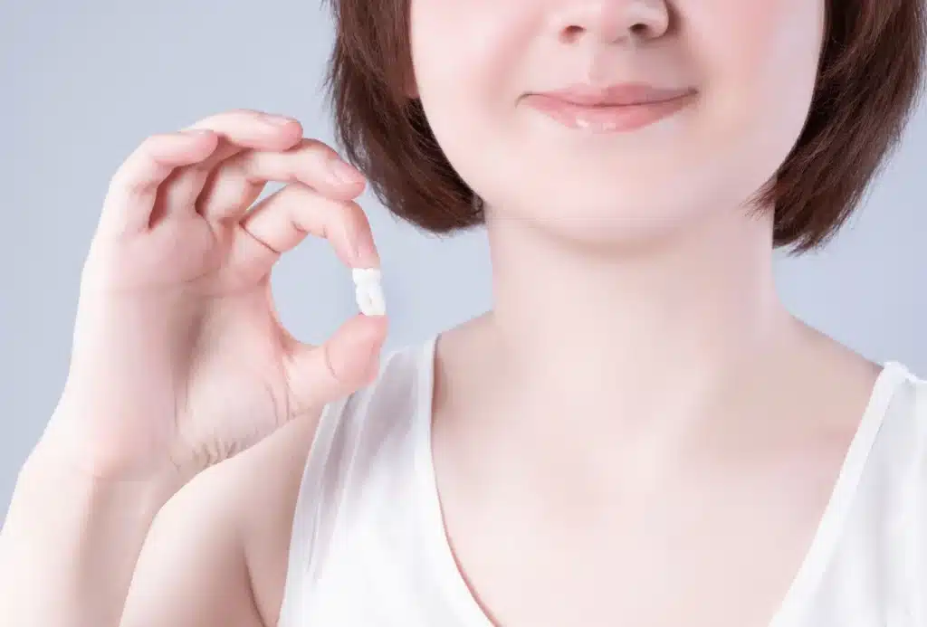 Patient Holding Extracted Teeth